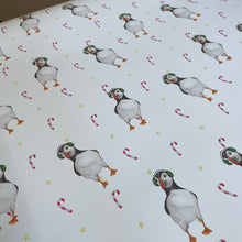 Load image into Gallery viewer, Puffin in Ear Muffs Wrapping Paper Sheet - lil wabbit

